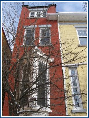 WEST WALL PARAPET AND BAY WINDOW